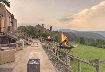 andBeyond Ngorongoro Crater Lodge outdoor dining crater views Ngorongoro Fly In Express