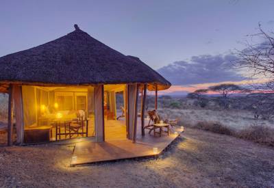 Sundowner drinks Serengeti tented camp Asilia Under Canvas Asilia Tanzania