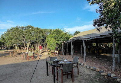 The Bush Lodge dining tent Kazinga Channel Rwenzori Mountains views Uganda