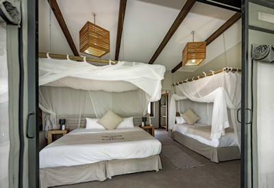 Adrift River Club spacious river-facing suite private verandah Victoria Nile Uganda