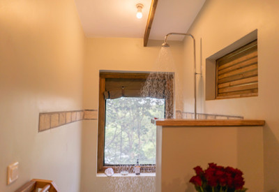 Adrift River Club beautiful en-suite bathroom contemporary amenities Uganda