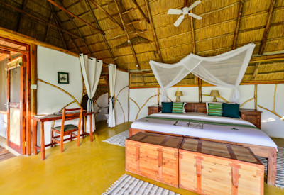 Bakers Lodge large romantic suite custom-made wooden furniture Nile views Uganda