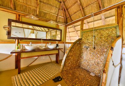 Bakers Lodge large indoor shower twin basin en-suite Murchison Falls Uganda