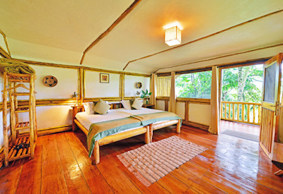 Buhoma Lodge beautifully appointed en-suite bedroom rain shower Bwindi Uganda