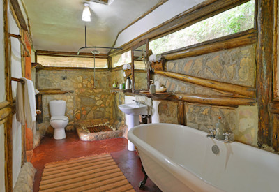 Buhoma Lodge en-suite bathtub flush toilet rain shower Bwindi Uganda