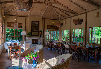 Volcanoes Bwindi Lodge dining room farm-to-table cuisine Bwindi Uganda