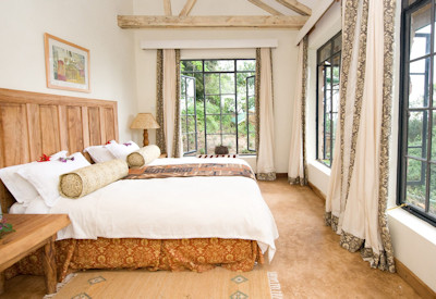 Clouds Mountain Gorilla Lodge volcanic stone cottage unforgettable vistas Uganda