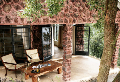 Clouds Mountain Gorilla Lodge private veranda seating forest views Uganda