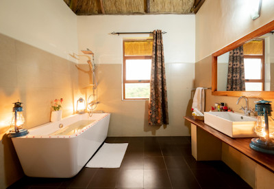 Crater Safari Lodge en-suite bathroom bathrobe complimentary toiletries Kibale Uganda