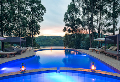 Crater Safari Lodge swimming pool manicured lawns crater lake views Kibale Uganda
