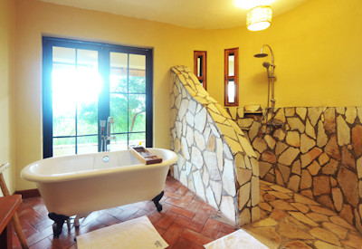 Elephant Plains Lodge en-suite bathtub cottage Queen Elizabeth Uganda