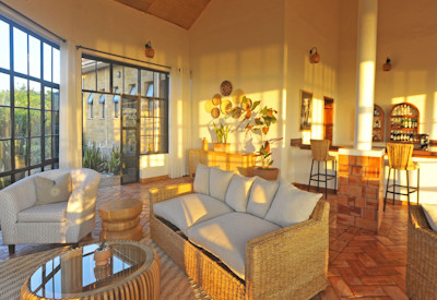 Elephant Plains Lodge central guest area lounge bistro bar Uganda
