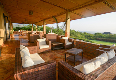 Elephant Plains Lodge open-air lounge 270 degree views Uganda
