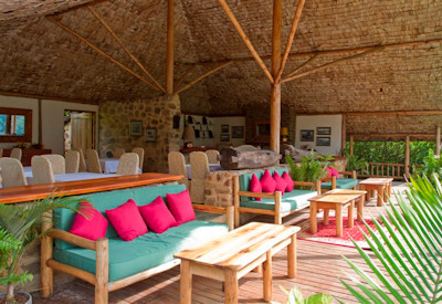 Engagi Lodge open-air lounge local rock eucalyptus materials Bwindi Uganda