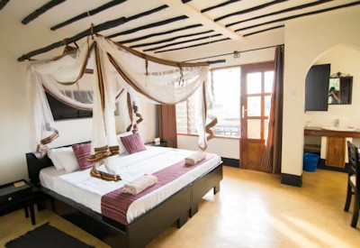 Fort Murchison suite imposing tower Swahili style earth-toned walls Uganda