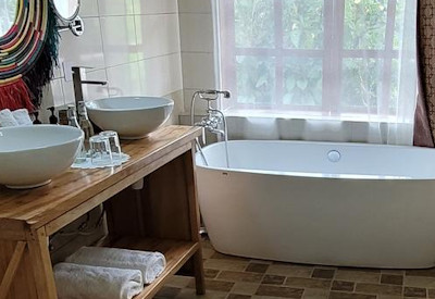 Gorilla Safari Lodge large en-suite bathroom hot cold water Bwindi Uganda