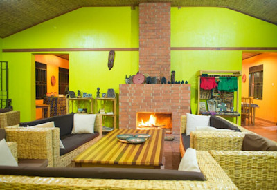 Gorilla Valley Lodge modern retro lounge fireplace Bwindi Forest Uganda