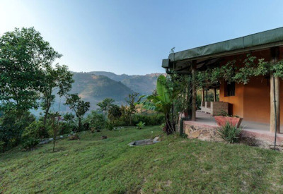 Gorilla Valley Lodge morning mist tropical forest views Bwindi Uganda