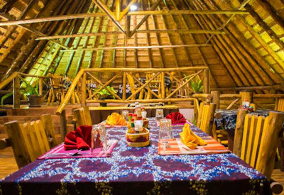Kibale Forest Camp thatched restaurant garden views Kibale National Park Uganda