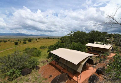 Kidepo Savannah Lodge spacious tented suite private verandah Kidepo Valley views Uganda