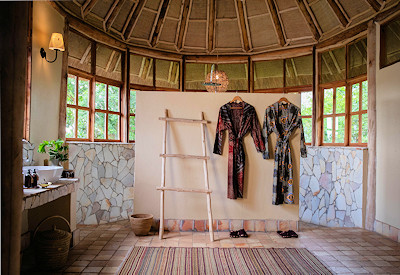 Kyambura Gorge Lodge en-suite double vanity indoor outdoor shower Uganda