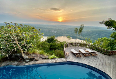 Kyaninga Lodge rock-carved swimming pool viewing deck Lake Kyaninga Uganda