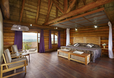 Kyaninga Lodge twin double bed cottage handcrafted furnishings Kibale Uganda
