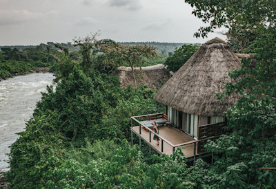 Lemala Wildwaters Lodge secluded private wooden deck day bed Victoria Nile Uganda