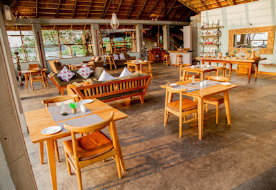 Lemala Wildwaters Lodge thatched lounge library dining Victoria Nile rapids Uganda