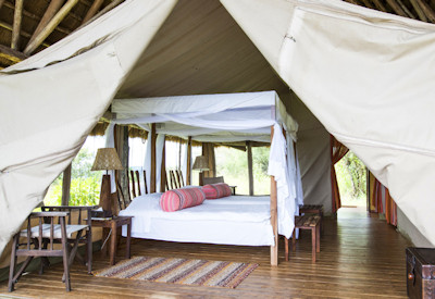 Mihingo Lodge tented safari suite mosquito netting solar hot water Lake Mburo Uganda
