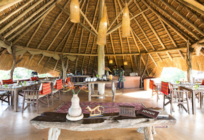 Mihingo Lodge thatched lounge dining room wine list observation tower Lake Mburo Uganda