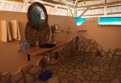 Murchison River Lodge large en-suite bathroom hot water solar power Uganda