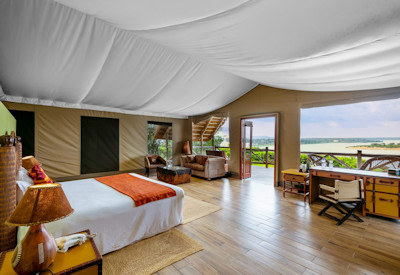 Mweya Safari Lodge luxury cottage exceptional Kazinga Channel views Uganda