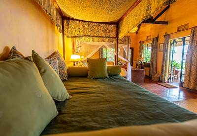 Ndali Lodge magnificent unique cottage stone wood thatch Kibale Uganda
