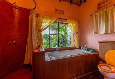 Ndali Lodge luxury en-suite bathroom hot shower fireplace Kibale Uganda