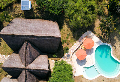 Nile Safari Lodge swimming pool sun loungers River Nile views Uganda