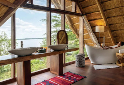 Nile Safari Lodge en-suite indoor outdoor shower freestanding bathtub Uganda