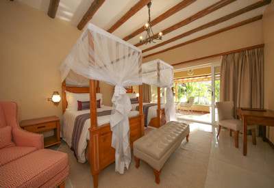 Hotel No.5 bedroom en-suite bathroom mosquito net tea coffee facilities Uganda