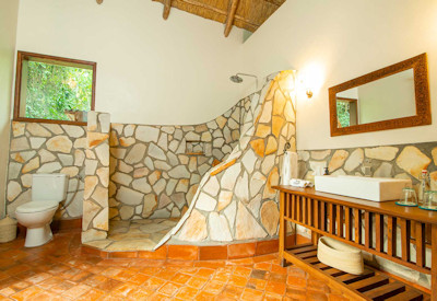 Primate Lodge Kibale large en-suite bathroom shower Kibale National Park Uganda