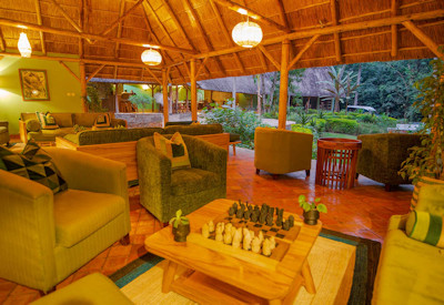 Primate Lodge Kibale lounge veranda forest views Kibale National Park Uganda