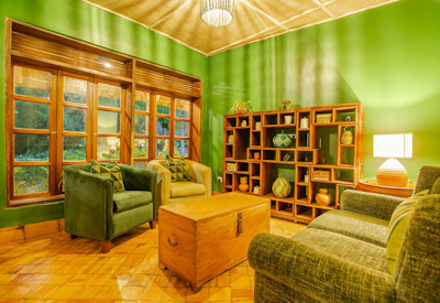 Primate Lodge Kibale private lounge campfire evening Kibale National Park Uganda