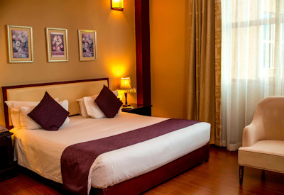 Protea Hotel Entebbe standard room suite contemporary décor satellite TV Entebbe Uganda