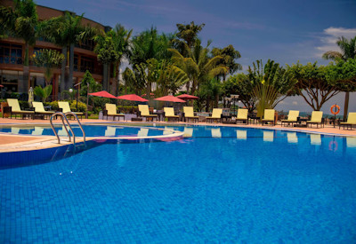 Protea Hotel Entebbe large outdoor swimming pool sun deck Lake Victoria Uganda