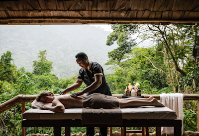 Sanctuary Gorilla Forest Camp mini spa Precious therapist yoga kits Uganda