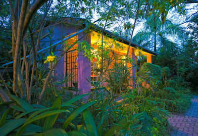 The Boma Entebbe manicured tropical gardens walkways Entebbe International Airport Uganda