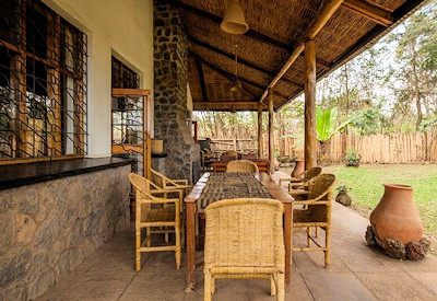Travellers Rest Hotel veranda garden Virunga volcanoes views Kisoro Uganda
