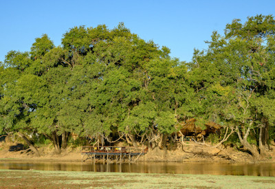 Eco friendly custom chalets blending simple grass walls with innovative local design at Big Lagoon Trails Camp