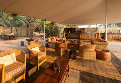 Busanga Bush Camp open-fronted lounge area Busanga Plains Kafue National Park Zambia