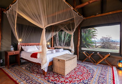 Busanga Plains Camp classic tented suite mosquito netting views Busanga Plains Zambia