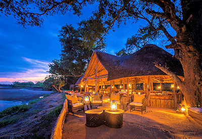 Rustic yet luxurious en-suite bathroom with an open view of the Luangwa River at Chamilandu Bushcamp